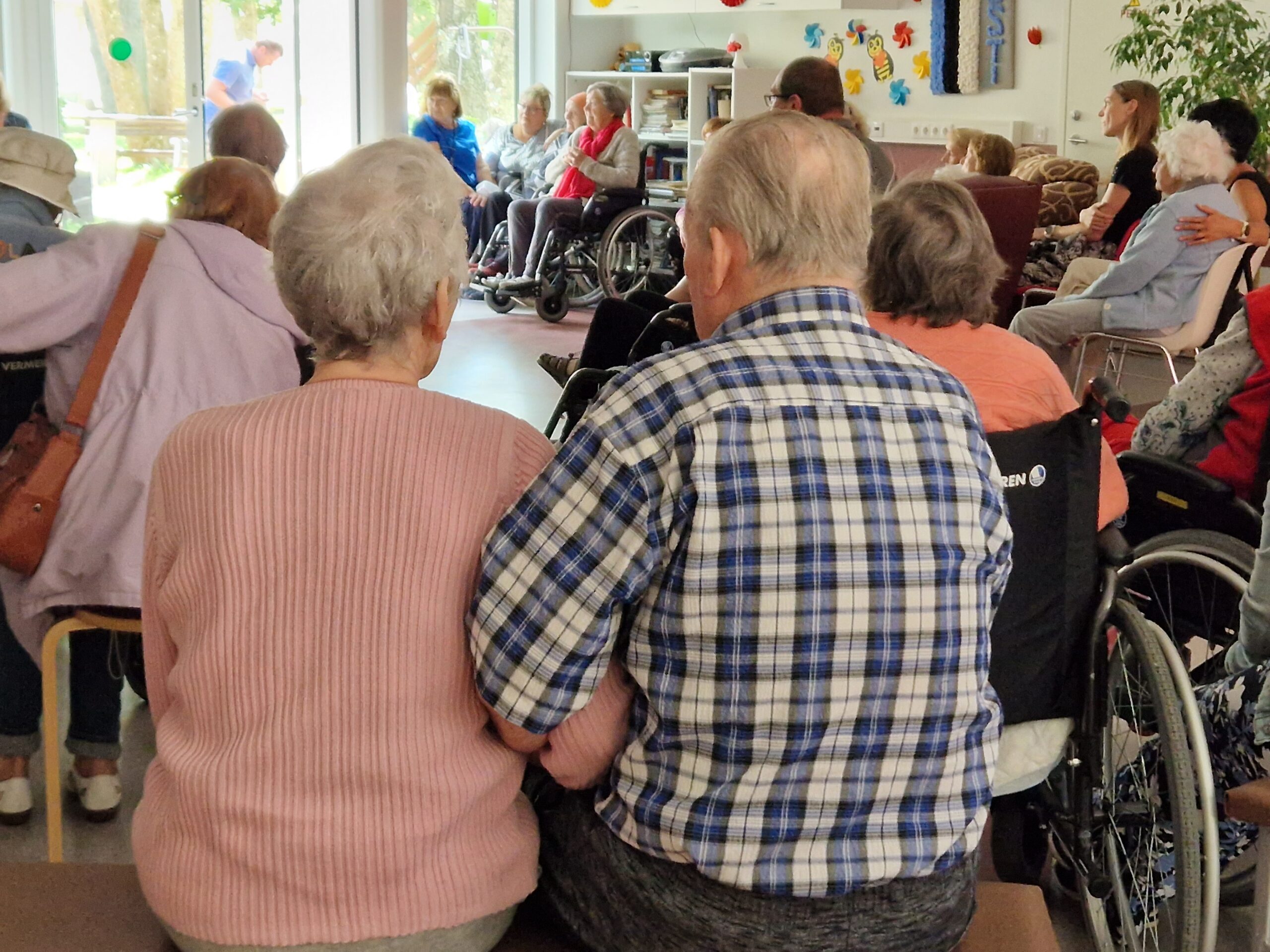 Elderly people in hospital family day